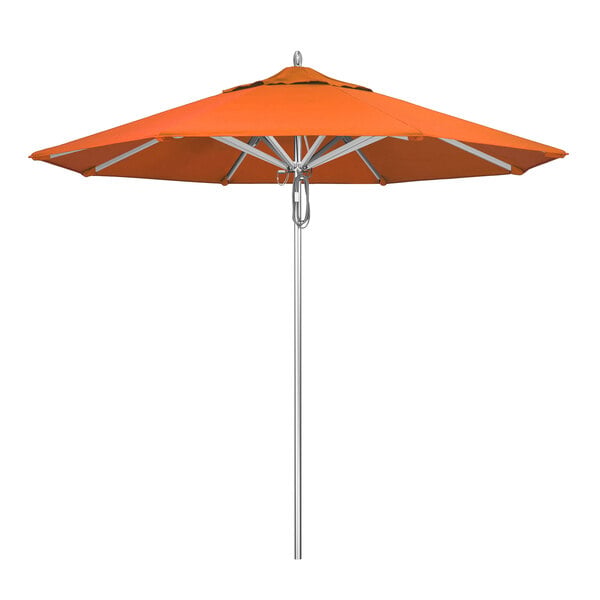A California Umbrella with a Sunbrella Tuscan canopy on a metal pole.