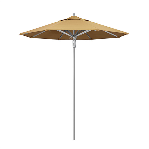 A California Umbrella with a Sunbrella Wheat canopy on an aluminum pole.