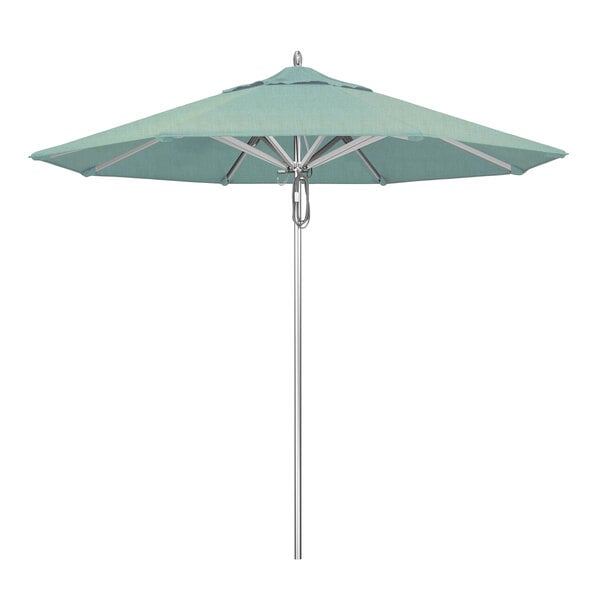 A close-up of a blue California Umbrella with a spa blue Sunbrella canopy.