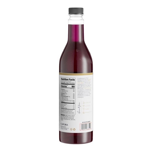 A close-up of a bottle of Capora Lavender Flavoring Syrup with a label.