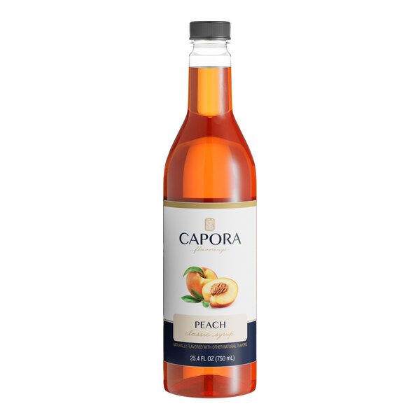 A bottle of Capora Peach Flavoring Syrup with a white label.