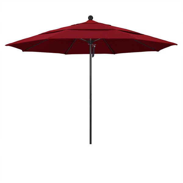 A red California Umbrella on a black pole.