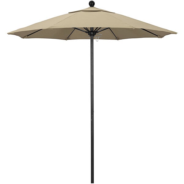 A California Umbrella round outdoor table umbrella with a black pole and antique beige Sunbrella canopy.
