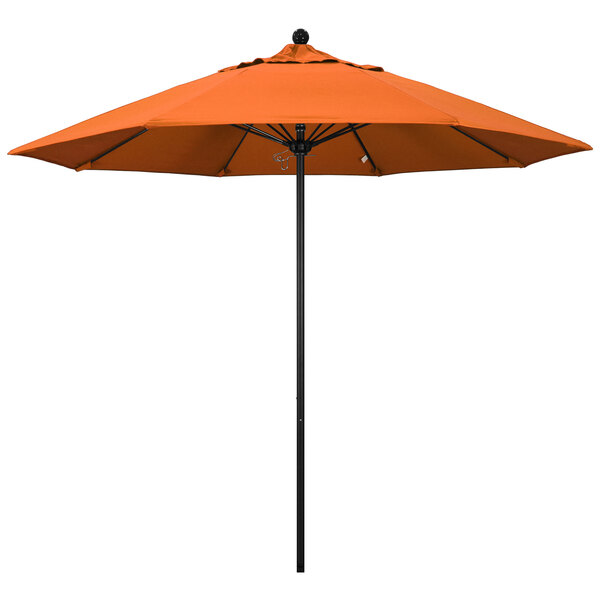 An orange California Umbrella with a black pole.