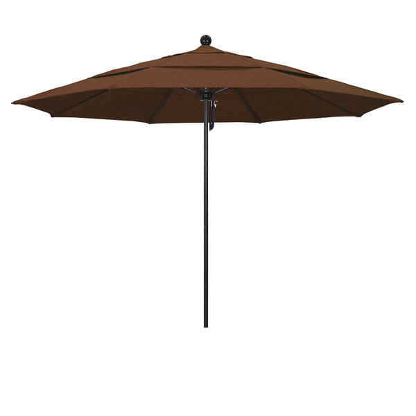 A close-up of a brown California Umbrella ALTO Olefin round umbrella on a black pole.