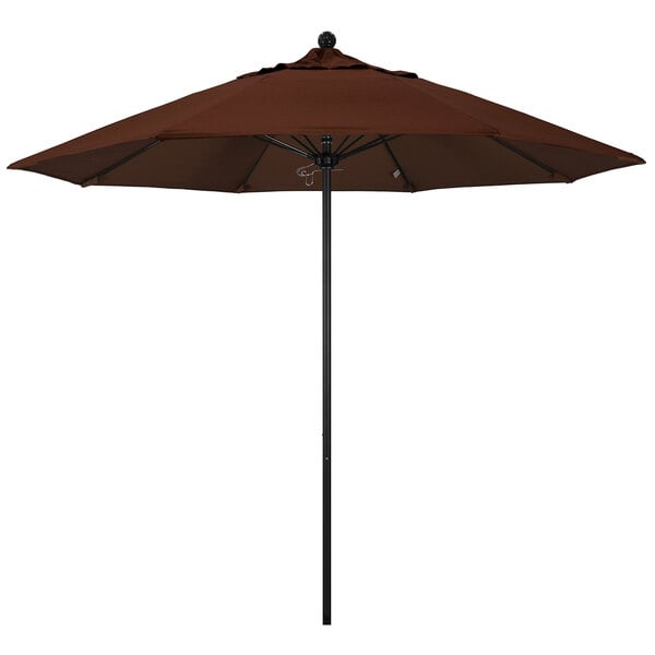 A close-up of a California Umbrella brown umbrella on an aluminum pole.