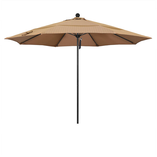 A tan California Umbrella with a black pole.