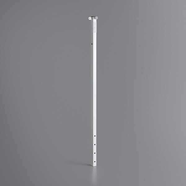 A white metal pole with screws.