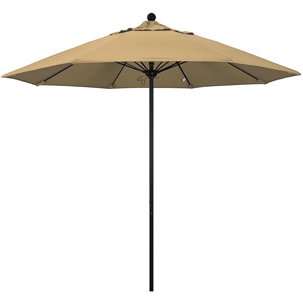 A tan California Umbrella on a black pole.