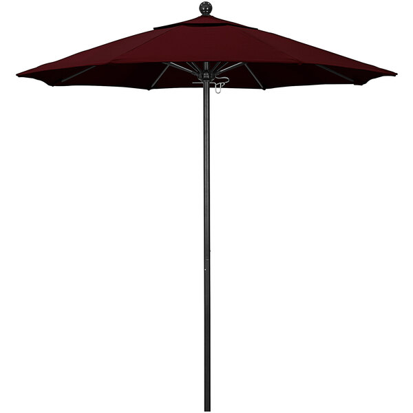 A California Umbrella Pacifica burgundy umbrella on a black pole.