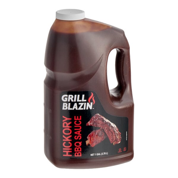 A 1-gallon jug of Grill Blazin' Hickory BBQ Sauce.