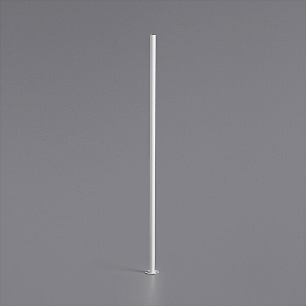 A white pole with a white base on a gray surface.