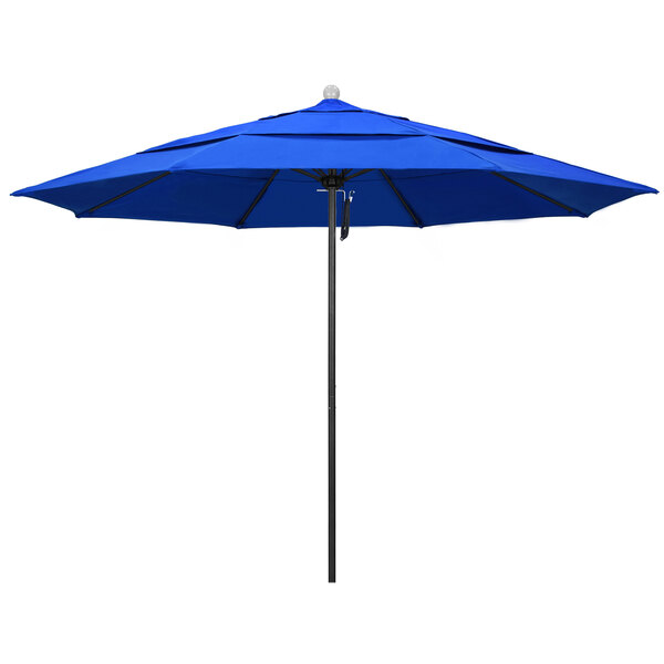 a blue umbrella with a white ball on top