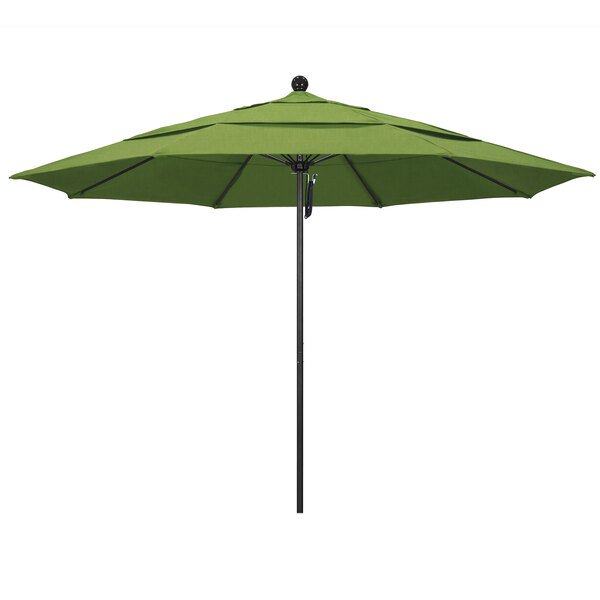 A green California Umbrella on a black pole.