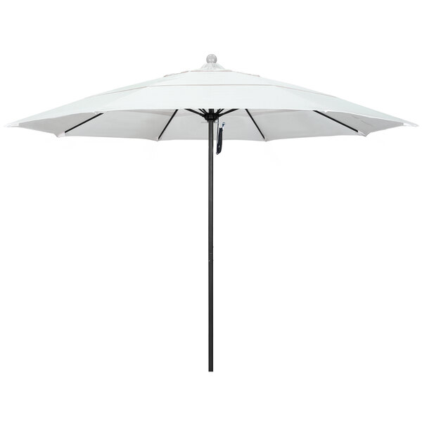 A white California Umbrella with a black pole.