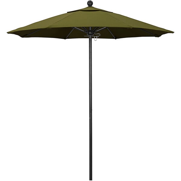 A green California Umbrella on a black pole.