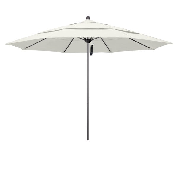A white California Umbrella with a black pole.