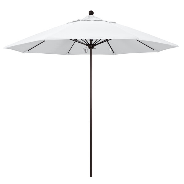 A white California Umbrella with a black pole.