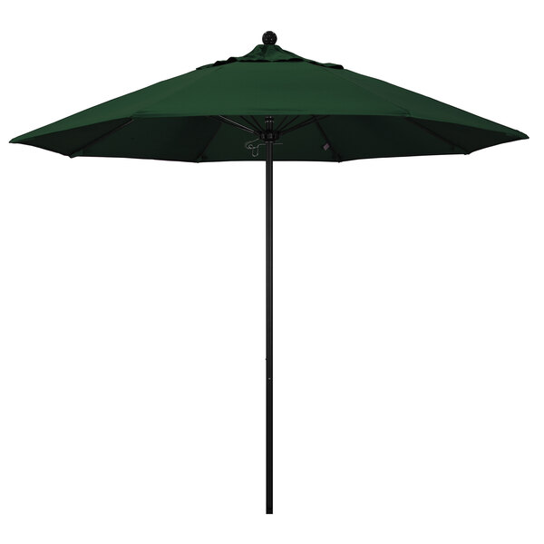 A Pacifica hunter green umbrella with a black pole.
