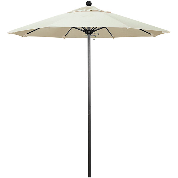 A white California Umbrella with a black pole.