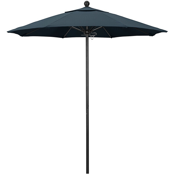 A California Umbrella with a Pacifica Sapphire canopy on a black pole.