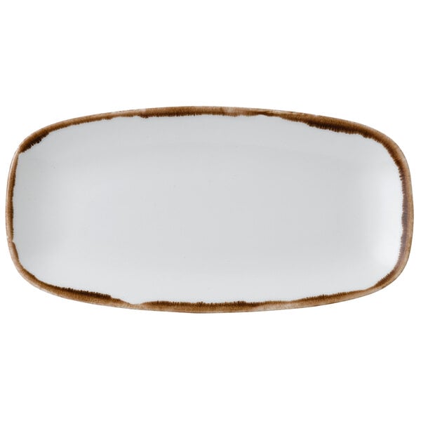 a white plate with brown edges