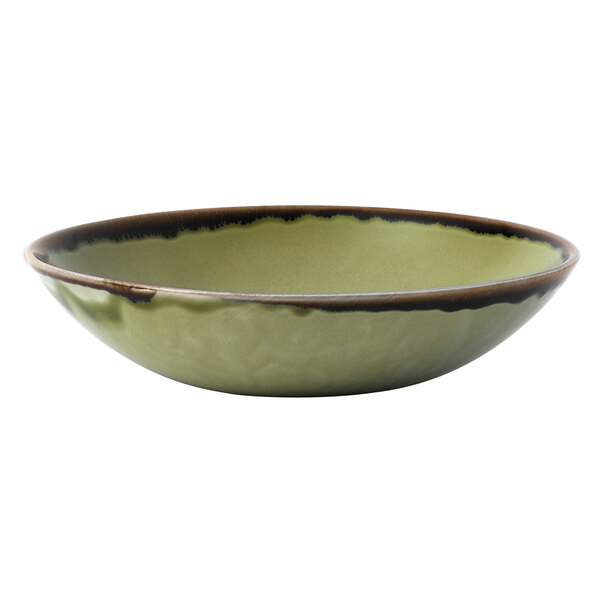 A close up of a green Dudson Harvest coupe bowl with a brown rim.