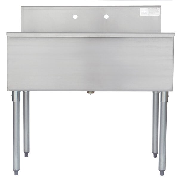 A stainless steel Advance Tabco utility sink with legs.