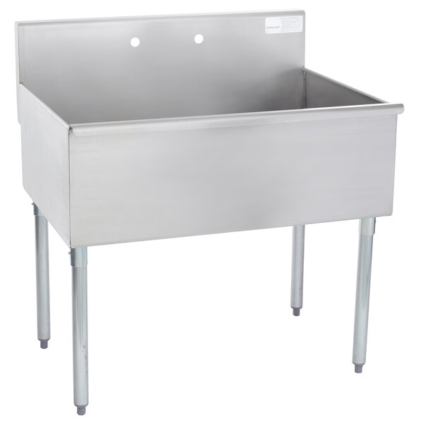 An Advance Tabco stainless steel commercial sink with legs.