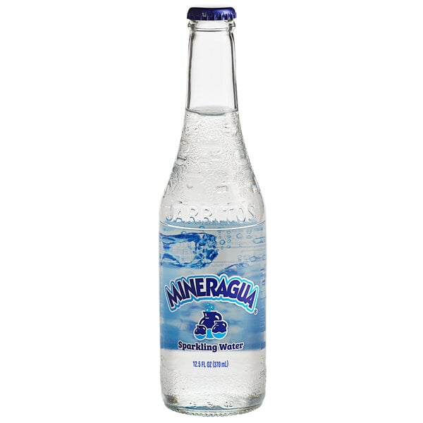 A clear Jarritos Mineragua bottle filled with sparkling water.