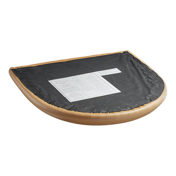 A Lancaster Table & Seating light brown vinyl cushion on a wood chair.