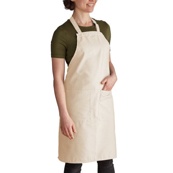 a woman wearing a white apron