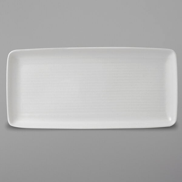 A white rectangular Dudson stoneware platter with a thin rim.