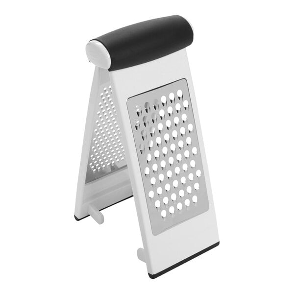 A white, two-sided grater with a black non-slip handle and stainless steel grating surfaces.