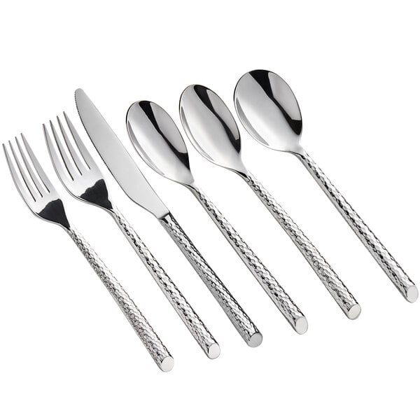 A group of Acopa Iris stainless steel bouillon spoons.