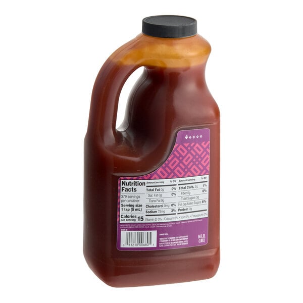 A large plastic jug of TABASCO Sweet Chili Hot Sauce with a handle and nutrition label.