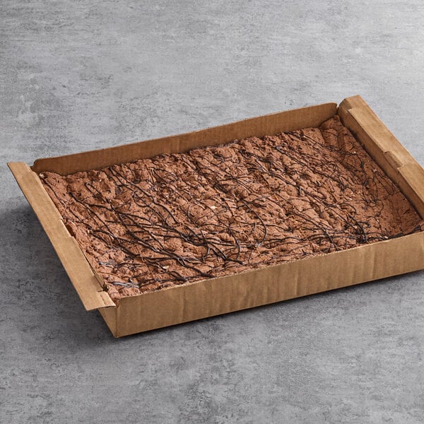 A David's Cookies brownie in a cardboard box.