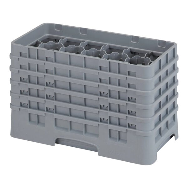 A grey plastic Cambro glass rack with extenders inside.