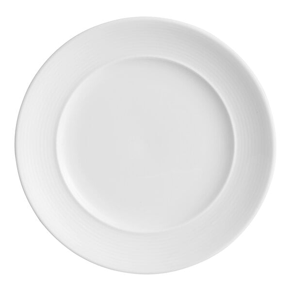 A round, bright white porcelain plate with embossed lines and a wide rim.