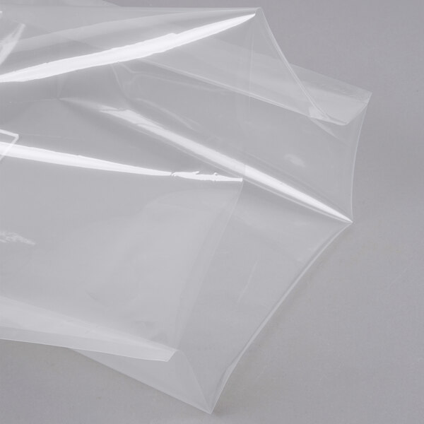 An ARY VacMaster chamber vacuum packaging pouch on a gray surface.