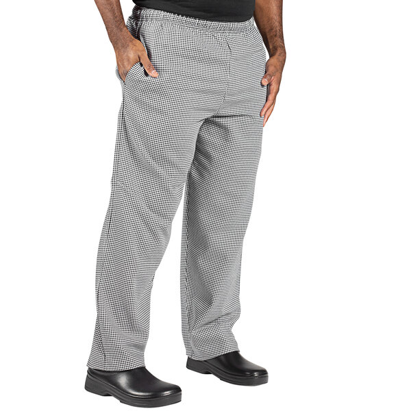 a person wearing pants with a checkered pattern