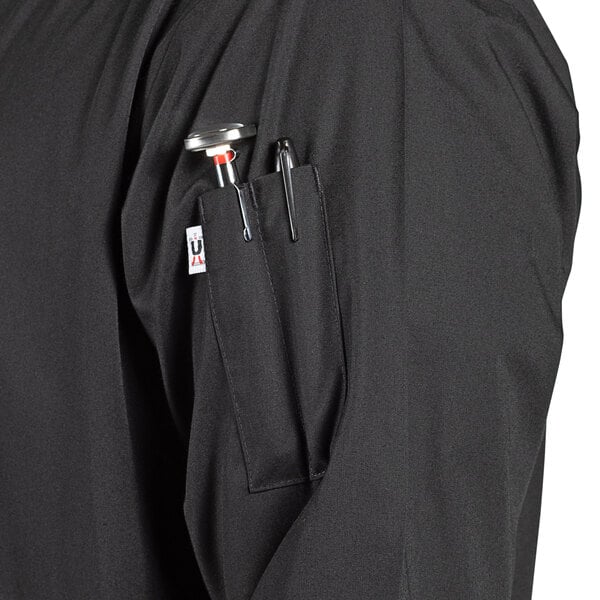 A black Uncommon Chef 3/4 sleeve chef coat with side vents and a pen and knife pocket.