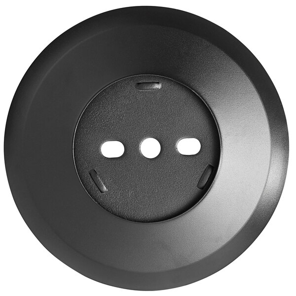 A black round Lancaster Table & Seating Excalibur bolt down plate with two holes.