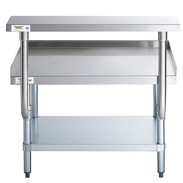 A Regency stainless steel equipment stand with shelves.