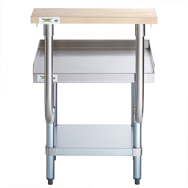 a stainless steel workbench with a shelf