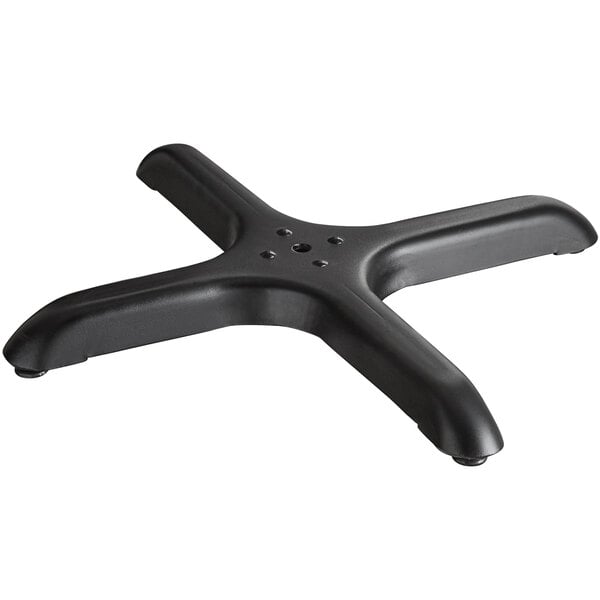 a black plastic object with four holes