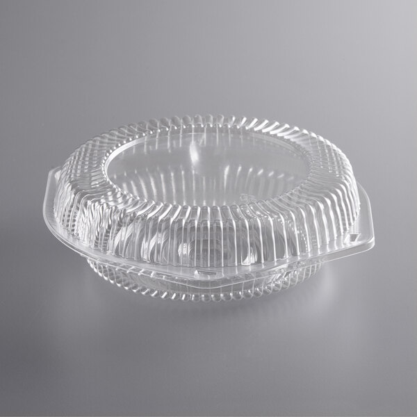 A Choice clear plastic pie container with low dome lid.