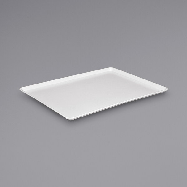 A white rectangular tray on a gray background.