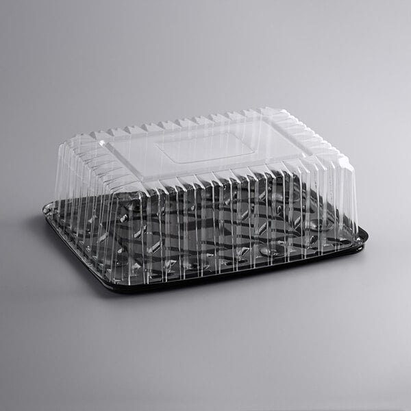 A clear plastic Choice sheet cake container with a lid.