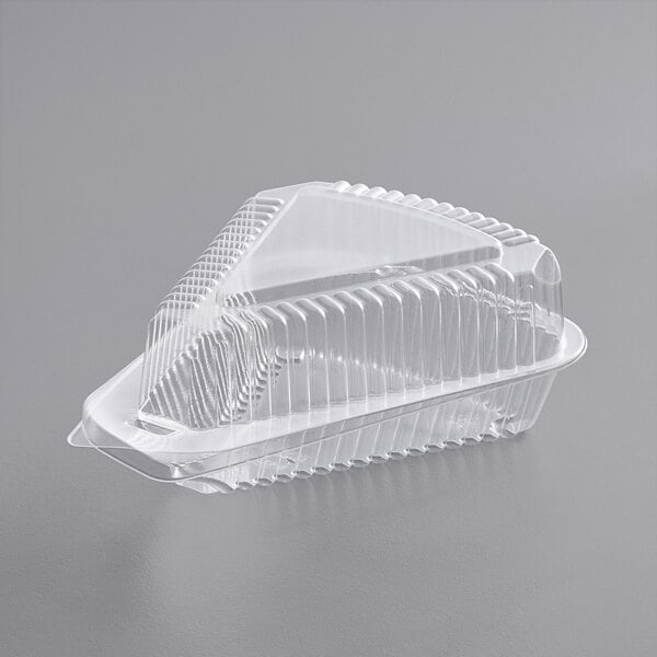 A Choice clear plastic container with a low dome lid.